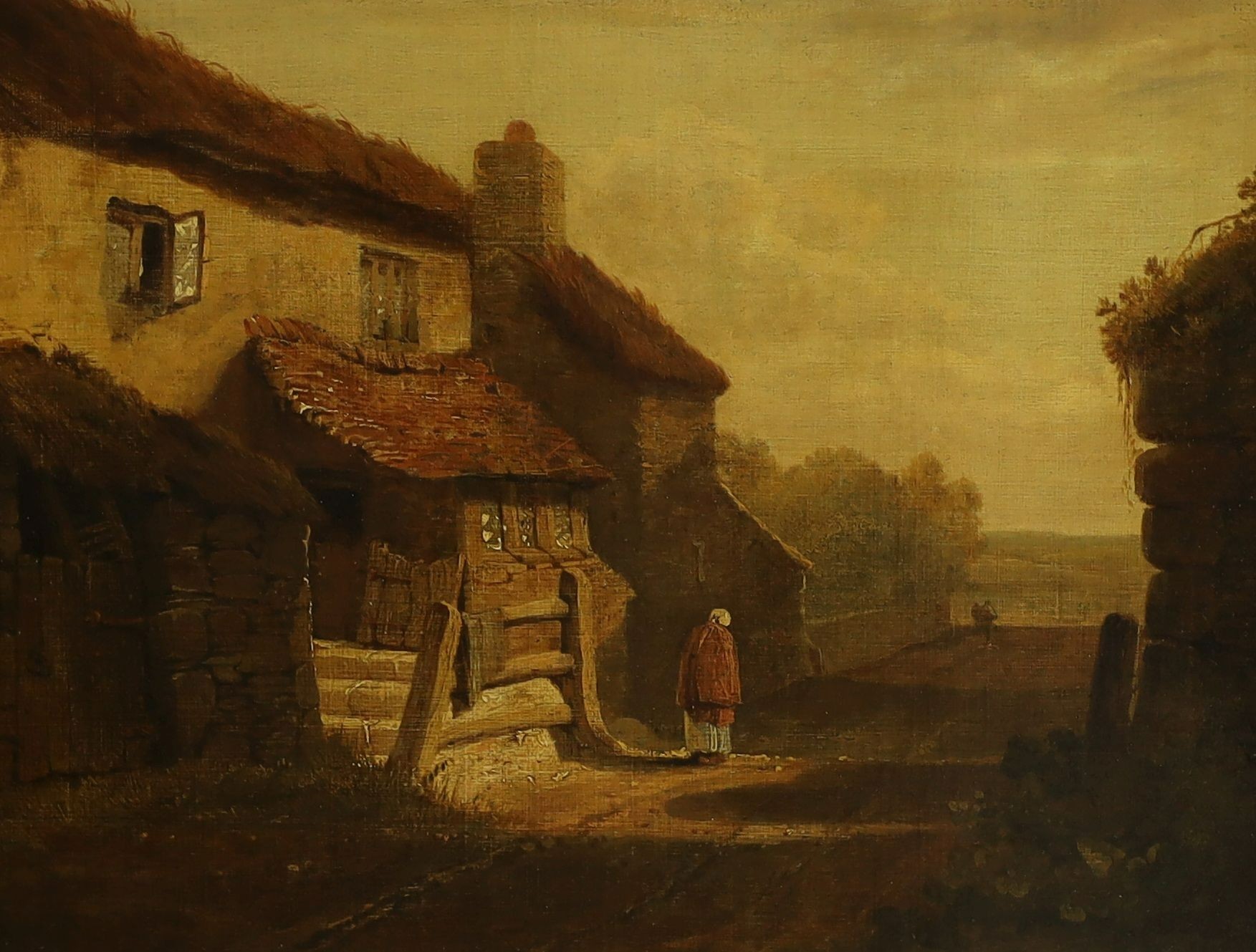 18th century English school, oil on canvas, woman on a lane passing cottages, 32 x 43 cm.